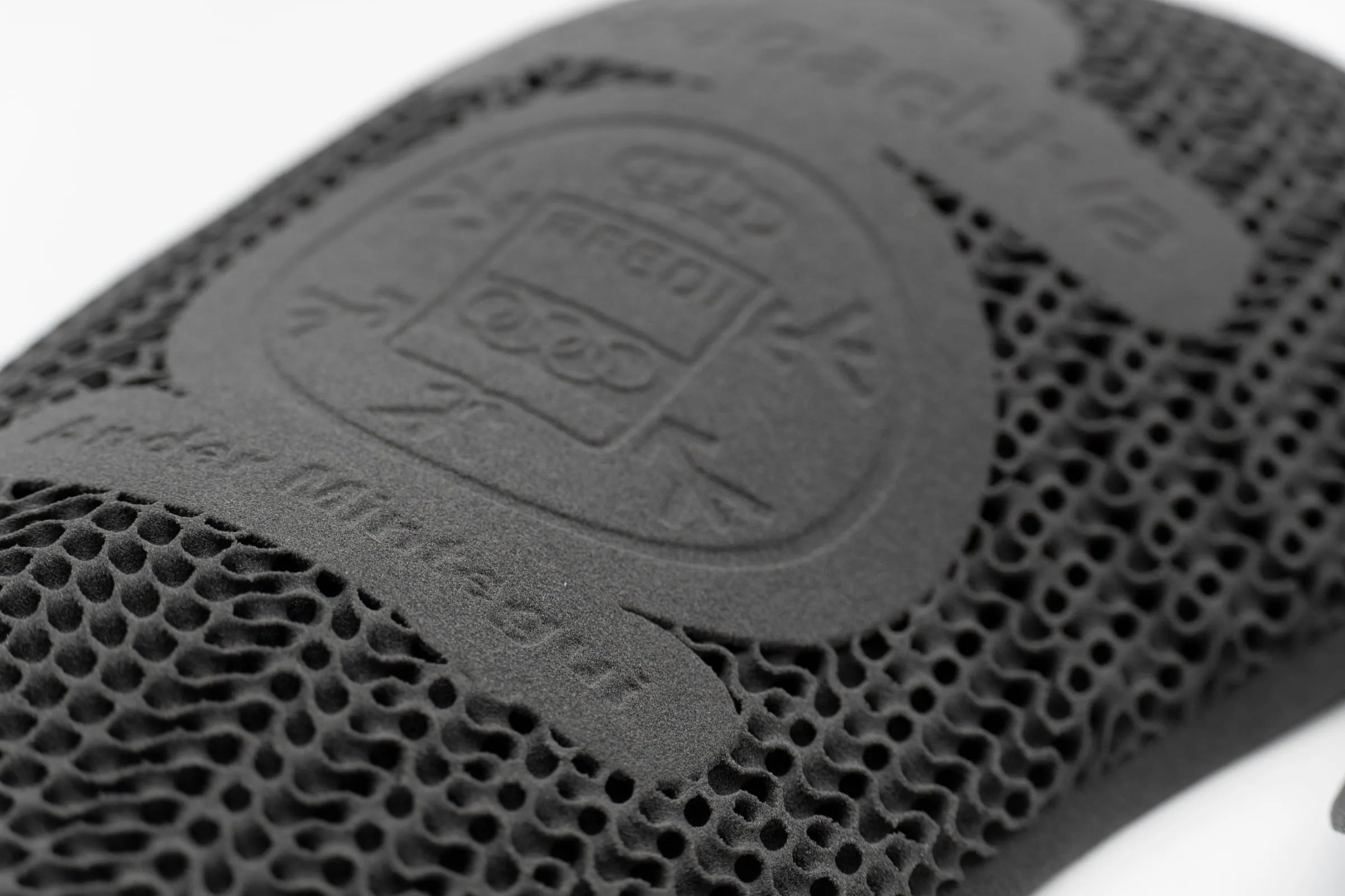 3D-printed flexible protection with honeycomb lattice and the Spain Snow crest